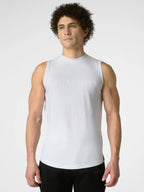 A man wearing a white sleeveless athletic tank top with 'DISTINCT ONE' printed across the chest in a subtle tonal font, paired with black athletic pants, against a light gray studio background.